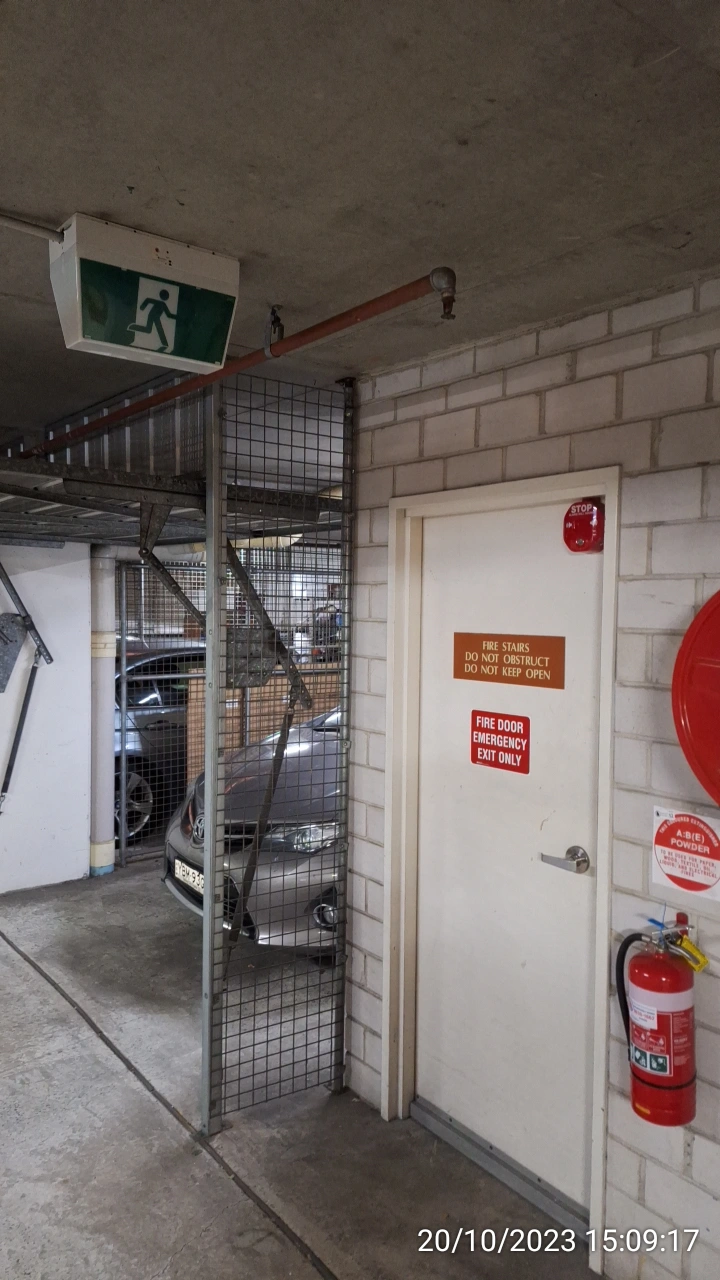 SP52948-Block-B-basement-faulty-fire-exit-light-photo-1-20Oct2023.webp