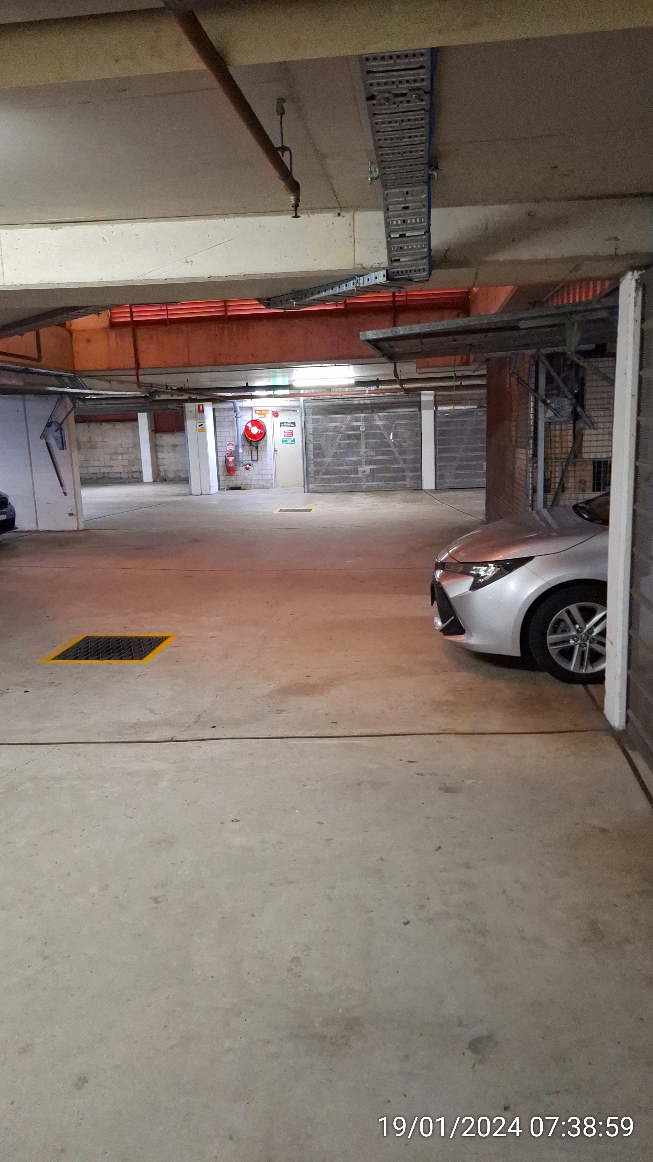 SP52948-basement-car-occupying-common-property-in-front-of-Lot-151-due-to-overloaded-garage-space-photo-1-19Jan2024.webp